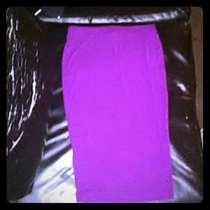 Hi, i am selling a purple, fitted, long skirt.